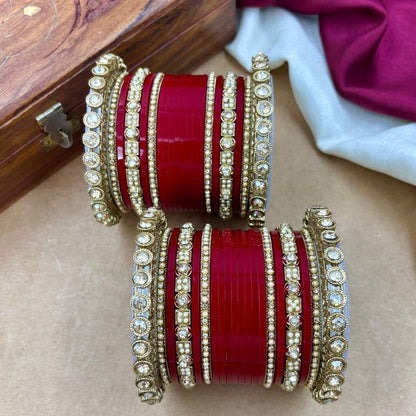 Contemplative Traditional Indian Bride in Red and Gold