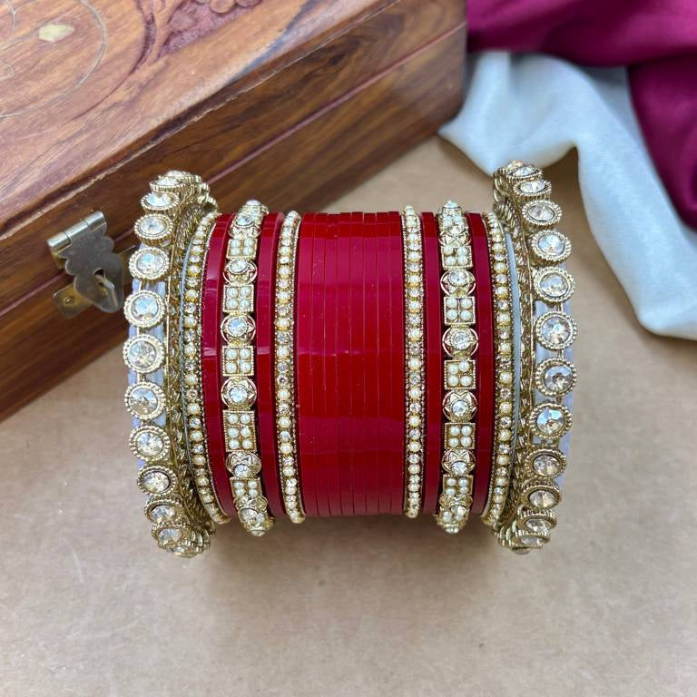 Contemplative Traditional Indian Bride in Red and Gold
