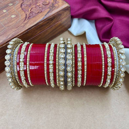 Contemplative Traditional Indian Bride in Red and Gold
